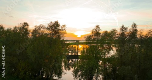 sunset over the lake and riber photo