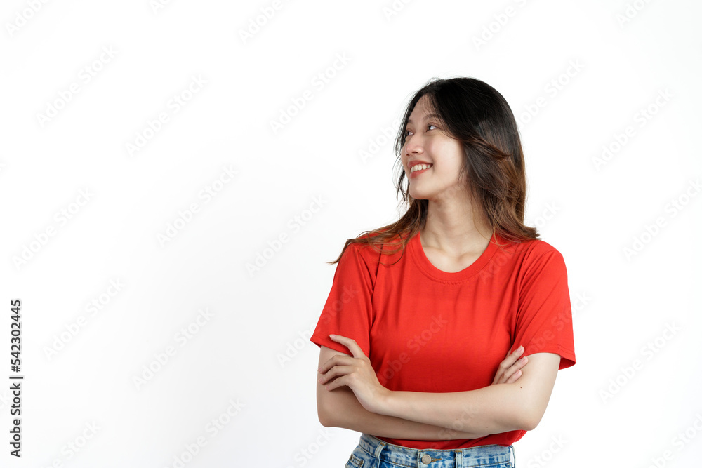 Happy pretty young asian woman red t-shirt isolated white background. looking blank area, copy space Happy pretty young asian woman red t-shirt isolated white background. looking blank area, copy space