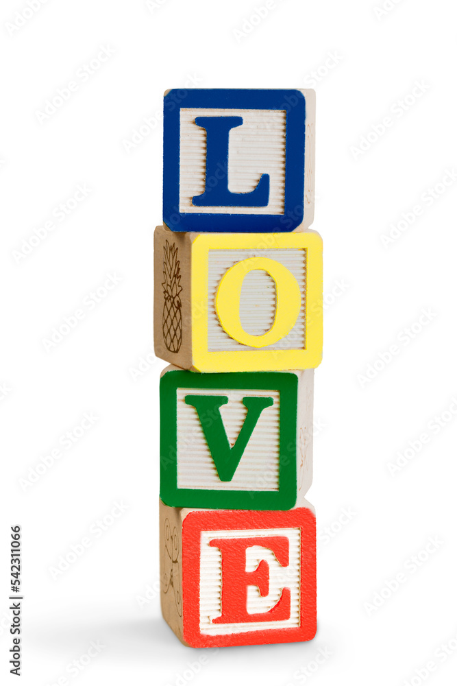 Toy wooden blocks stack with word love , tower of blank multicolor box cubes over white background Toy wooden blocks stack with word love , tower of blank multicolor box cubes over white background