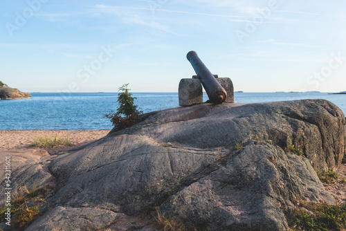 View of Hanko town coast, Hango, Finland, with beach and coastal waterfront, wooden houses and beach changing cabins, Uusimaa, Hanko Peninsula, Raseborg sub-region, summer sunny day photo