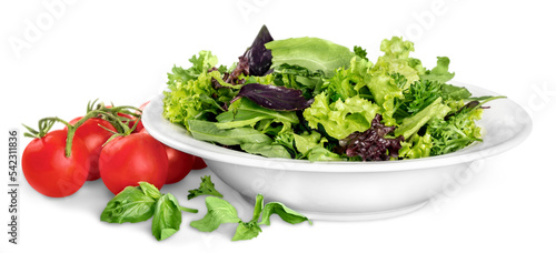 Close-up photo of fresh salad with vegetables in white plate