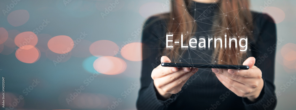 E-learning and phone in hand E-learning and phone in hand