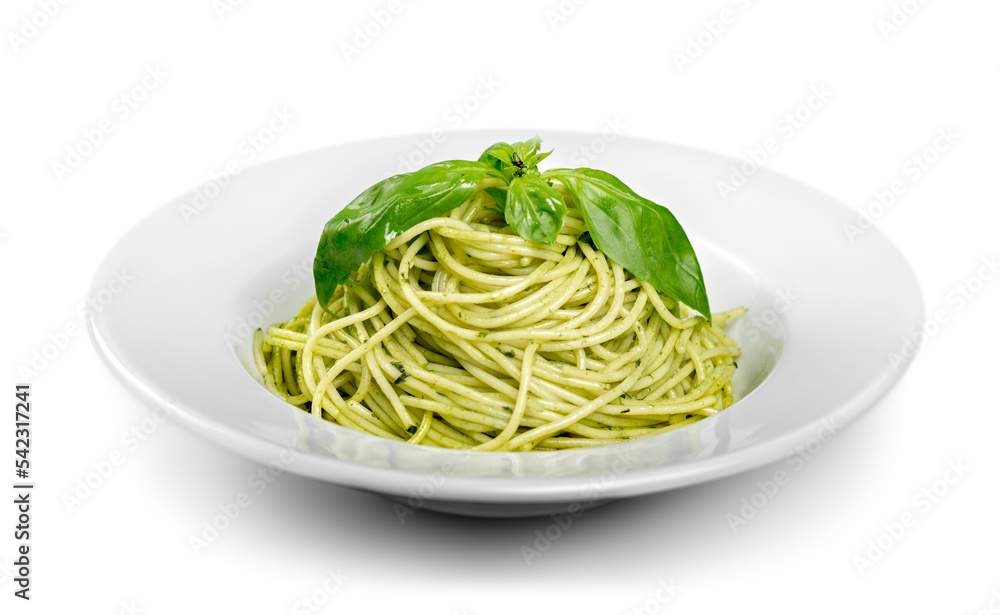 Italian pasta spaghetti with pesto sauce and basil leaf close-up Italian pasta spaghetti with pesto sauce and basil leaf close-up
