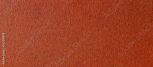 Dark red brown knitted fabric texture.  wool or tweed fabric for grunge background. Detailed warm yarn. photo