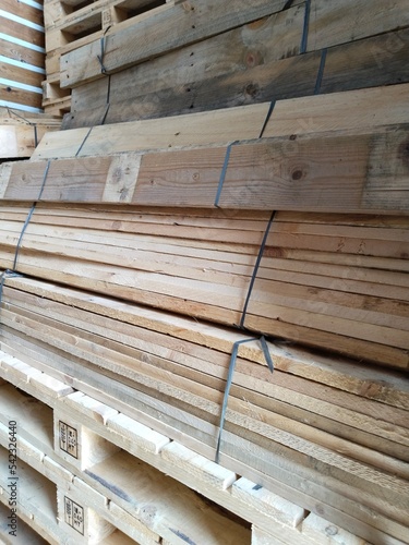 pile of wooden pallets. Wooden pallets have many uses, including for storing goods, stacking, and protecting goods that will be sent or moved by Forklift.