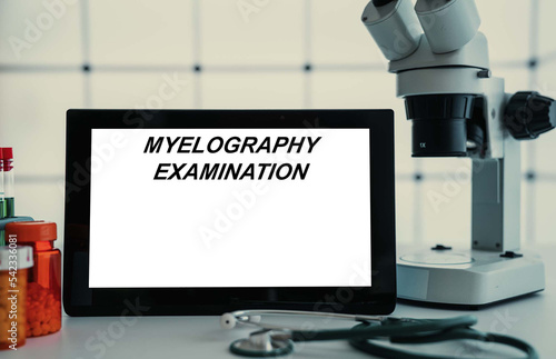 Medical tests and diagnostic procedures concept. Text on display in lab Myelography Examination photo