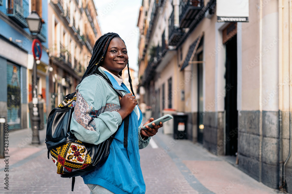 Fototapeta premium Black Woman Using Cellphone