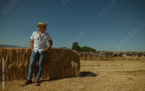 Adult man in cowboy hat in fields. Castilla y Leon, Spain
