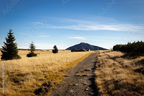 sniezka, the highest peak of the Sudetes. view from the golden autumn clearing. hotel lucni bouda and trail. Poland/Czech Republic photo