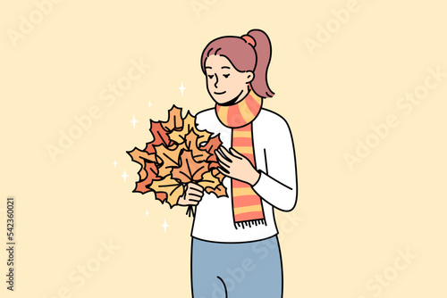 Happy young woman with bouquet of golden leaves in hands. Smiling girl enjoy gold autumn outdoors. Fall season. Vector illustration. 