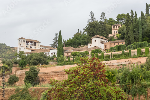 View at the Generalife Gardens and buildings full interior complex, Garden Water Channel, or Patio de la Acequia, on Alhambra citadel, Granada, Spain photo