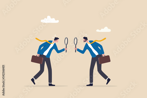 Suspicious or distrust partner, doubtful or pretending, analyzing fake or fraud, concerned or question of business transparency concept, suspicious businessman analyze each other with magnifying glass photo