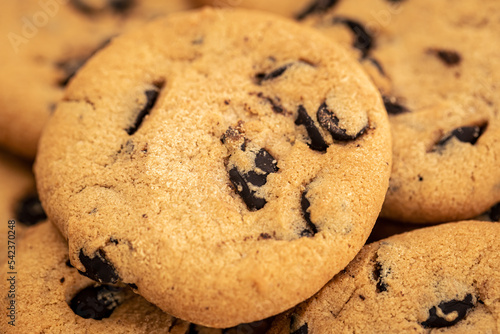 Cookies with chocolate chips close-up  food background.