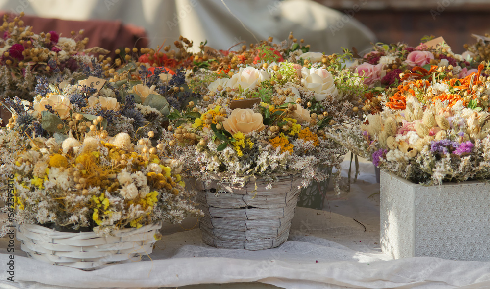 Arranged flowers at a stall at the Prague Naplavka street farmers market. No people, selective focus. Arranged flowers at a stall at the Prague Naplavka street farmers market. No people, selective focus.