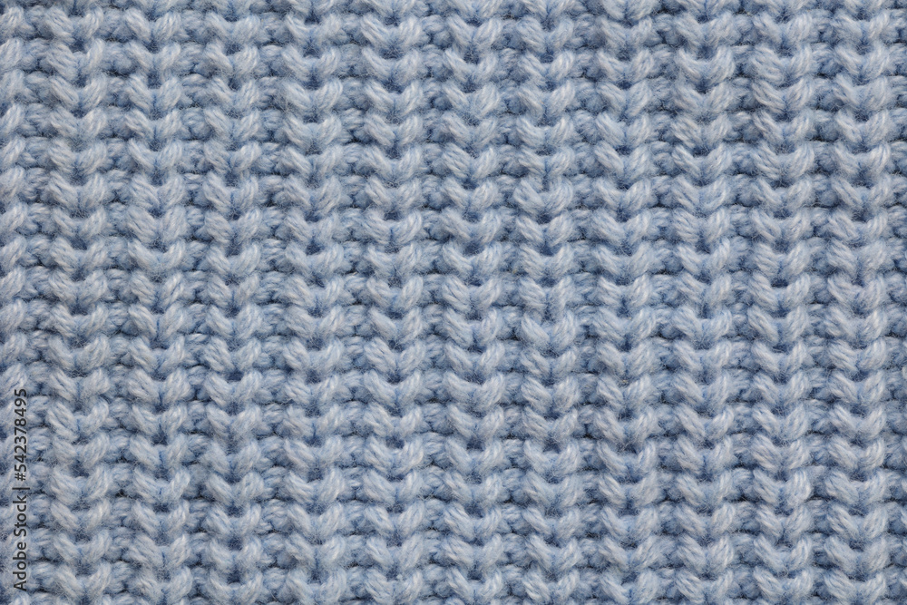Top view of a knitted fabric made of wool of light blue color Top view of a knitted fabric made of wool of light blue color