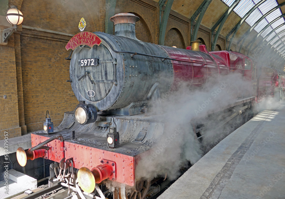 Fototapeta premium Hogwarts Express in Universal Studios on platform just before leaving
