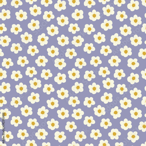 Seamless pattern with little cute chamomiles, daisies on a lilac background. Colorful vector doodle illustration. Field beautiful flower, spring and summer symbol hand drawn. Wrapping or fabric