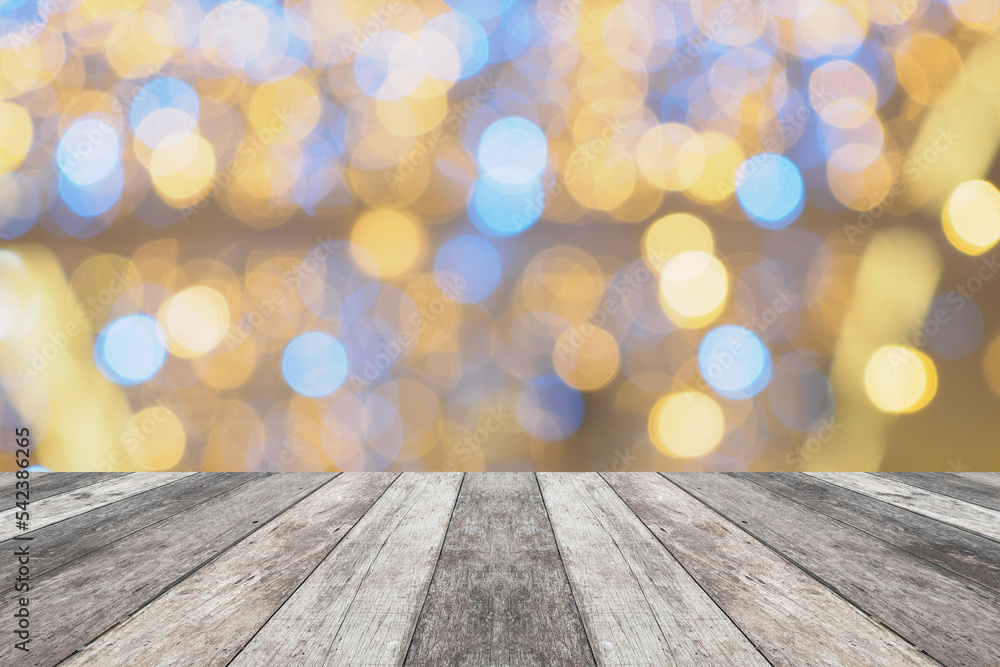 Empty wood table top with blur Christmas tree with bokeh light background Empty wood table top with blur Christmas tree with bokeh light background