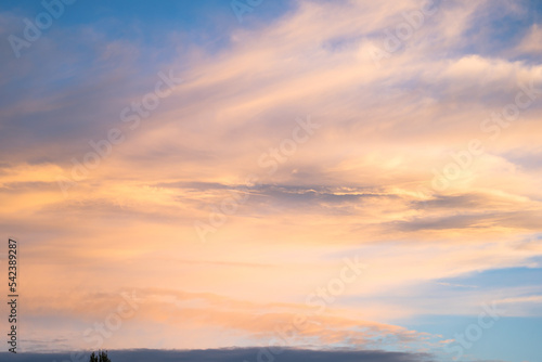 Blue sky with red clouds