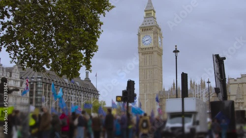 Brexit protest and pro EU flags being waved by Big Ben in a national re-join march protest London UK tilt shift lens