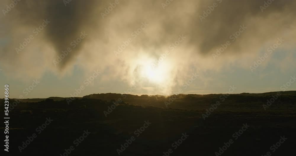 Low sun under steam geothermal lava landscape Gunnuhver Iceland close Low sun under steam geothermal lava landscape Gunnuhver Iceland close