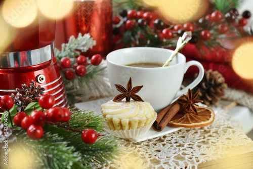 Christmas coffee on windowsill with festive decorations