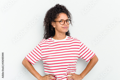 Young african american woman isolated frowning face in displeasure, keeps arms folded.