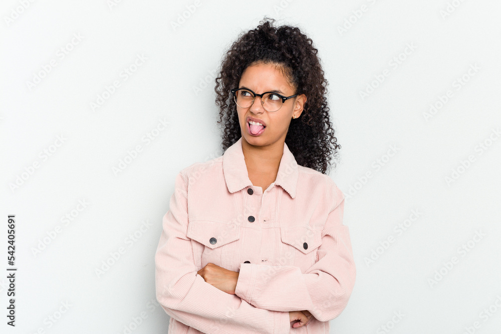 Young african american woman isolated funny and friendly sticking out tongue. Young african american woman isolated funny and friendly sticking out tongue.