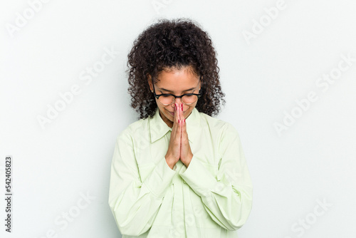 Slika na platnu Young african american woman isolated praying, showing devotion, religious person looking for divine inspiration