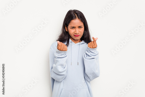 Young Indian woman isolated on white background showing that she has no money.