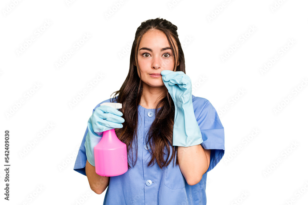 Young cleaner caucasian woman isolated on green chroma background with fingers on lips keeping a secret. Young cleaner caucasian woman isolated on green chroma background with fingers on lips keeping a secret.