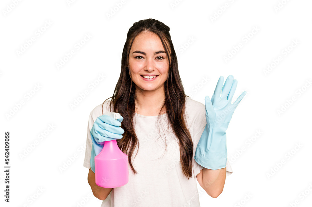 Young cleaner caucasian woman isolated on green chroma background smiling cheerful showing number five with fingers. Young cleaner caucasian woman isolated on green chroma background smiling cheerful showing number five with fingers.
