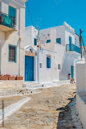 Beautiful stone-built street with old traditional houses in Chora of Amorgos in Greece