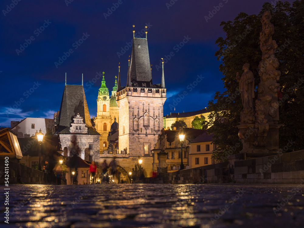 View of Charles Bridge in Prague in the night, Czech Republic. popular tourist attraction. Travel and sights of city breaks. landmarks, travel guide and postcard.