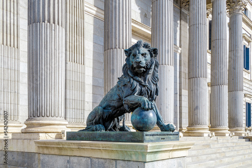 Parliament facade columns and lion in Madrid, Spain. Congreso diputados