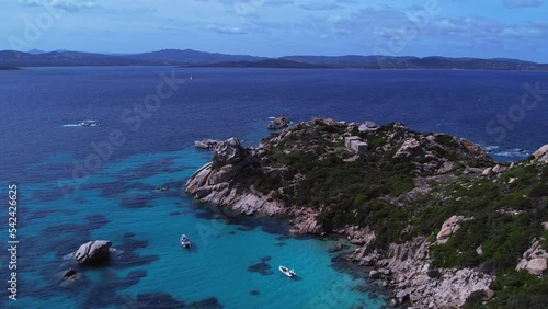 Aquamarine turquoise pirate bay Isola Rossa Sardinia Italy aerial  photo