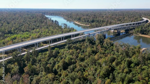 Florida state road 20 crossing the Apalachicola River viewed from above denoting the time zone change from eastern to central in the Florida panhandle photo