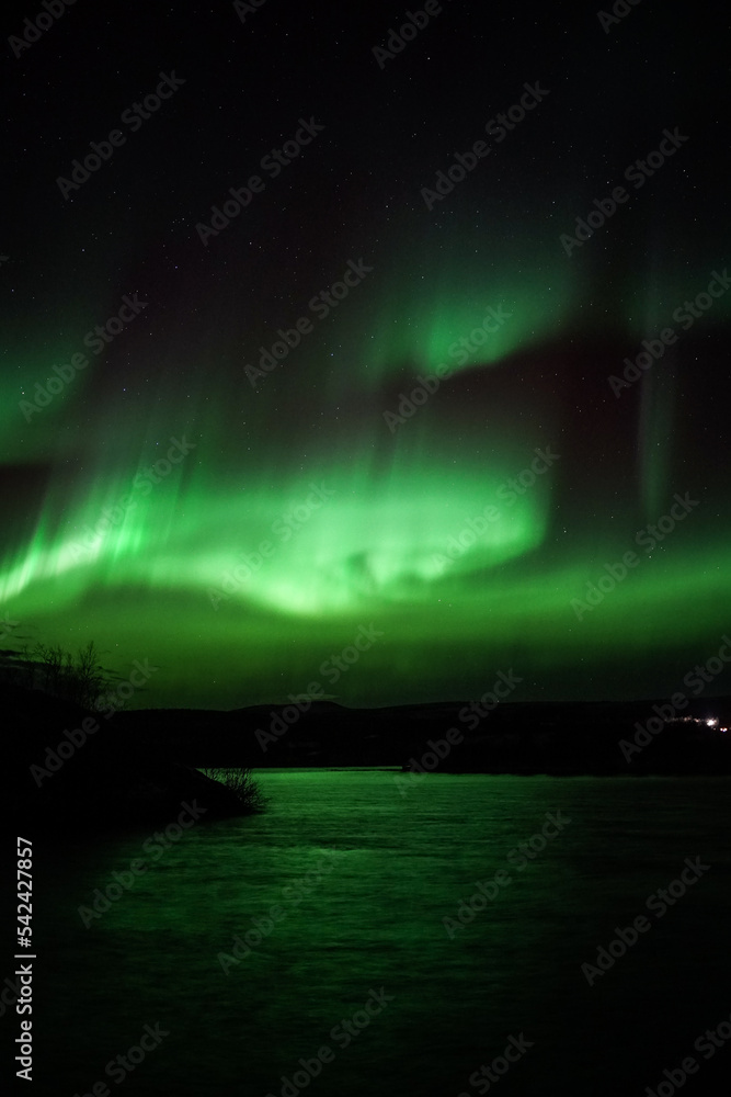Aurora in the sky over a lake