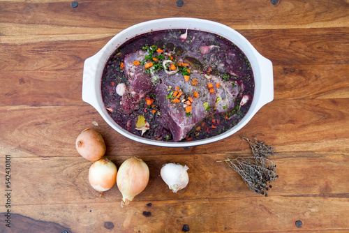 Wild boar marinade in a dish.