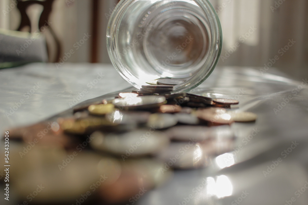 taking the savings out of the glass jar taking the savings out of the glass jar