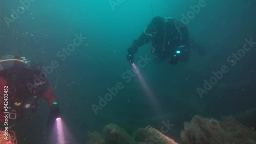 Divers Exploring a WWI German wreck underwater shot
Divers Exploring a WWI German wreck in Scapa Flow, Orkney Islands, Scotland, 2022
 photo