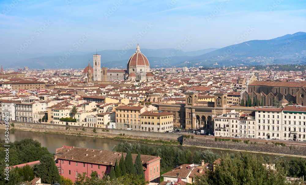 city scape of world heritage city of Florence in Tuscany, Italy with Dome and river Arno