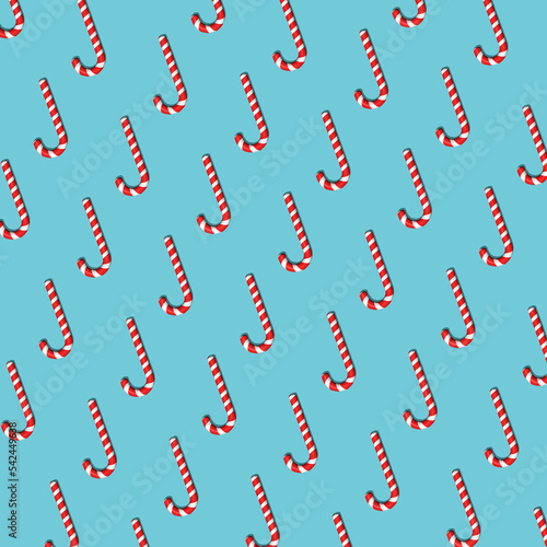 Seamless pattern of red striped sweetmeats. Hard candy  candy cane  lollipop. Background for fabric  wrapping paper  textile  print  wallpaper. Christmas and New Year background .