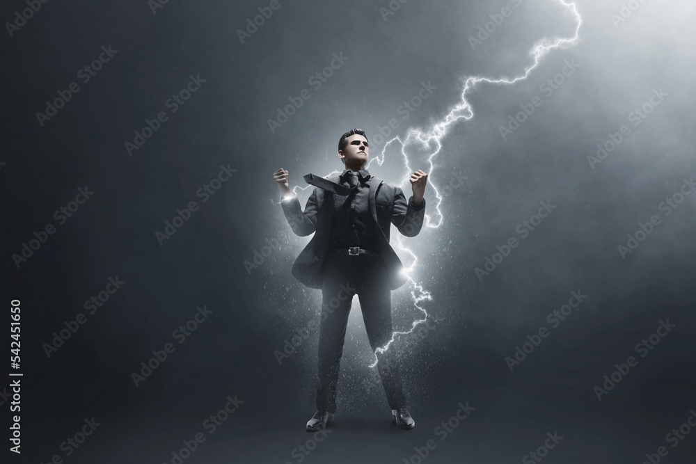 Fototapeta premium Strong business man on dark background