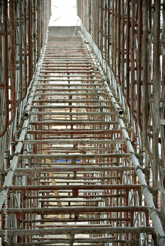 JOHOR, MALAYSIA -APRIL 13, 2016: Scaffolding used as the temporary structure to support platform, form work and structure at the construction site. Also used it as a walking platform for workers. 