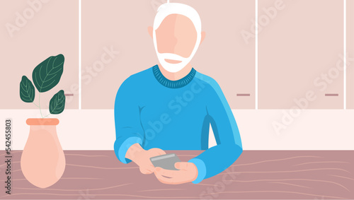 Älterer Herr mit Bart tippt in sein Smartphone zu Hause