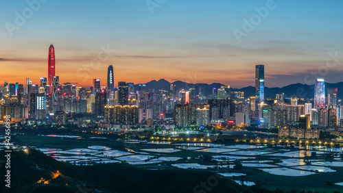 Photography Panorama of skyline of Shenzhen city, China at sunset