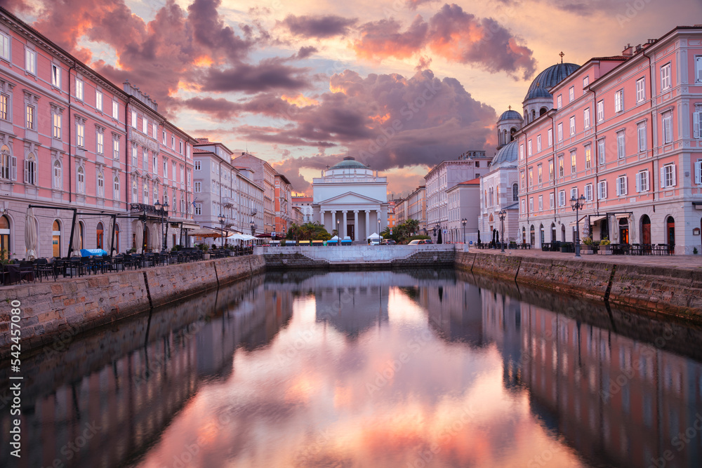 Trieste, Italy. Cityscape image of downtown Trieste, Italy at summer sunrise.