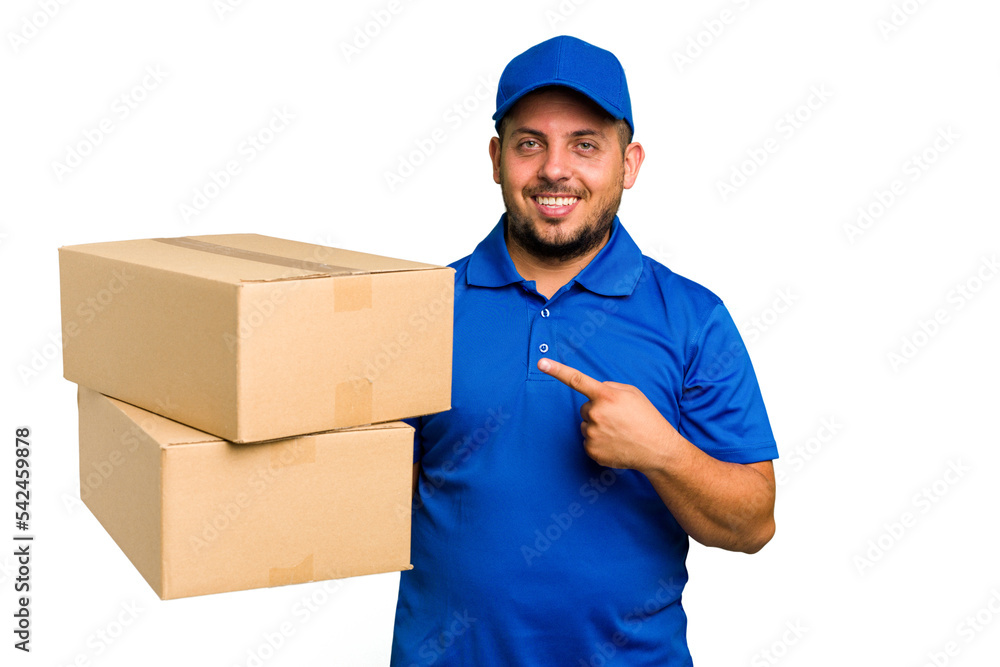 Delivery caucasian man isolated smiling and pointing aside, showing something at blank space. Delivery caucasian man isolated smiling and pointing aside, showing something at blank space.