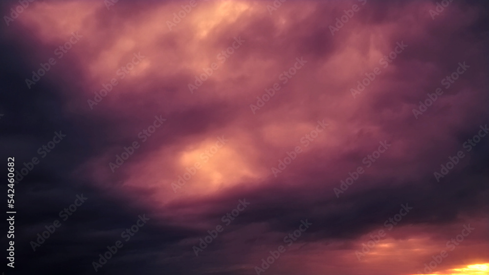 Dark rose and orange heavy sundown clouds - abstract 3D illustration